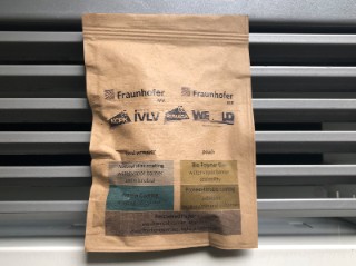 A resealable bag made of paper with the coating on the inside. After use, the packaging is placed in the waste paper recycling bin with the bioactive materials.