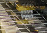 Automated printing of microarrays.